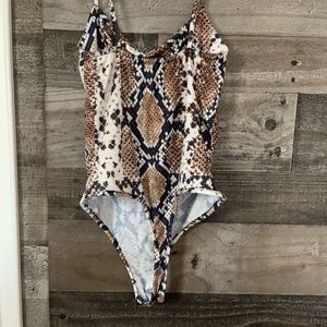Snake print spaghetti strap bodysuit.